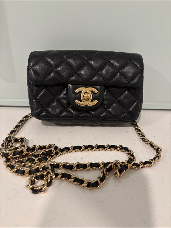 CHANEL Handbags - Chanel Extra Mini Classic Flap Black Lambskin Gold Hardware